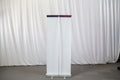 Entry-level retractable banner stand with spring-loaded aluminum base