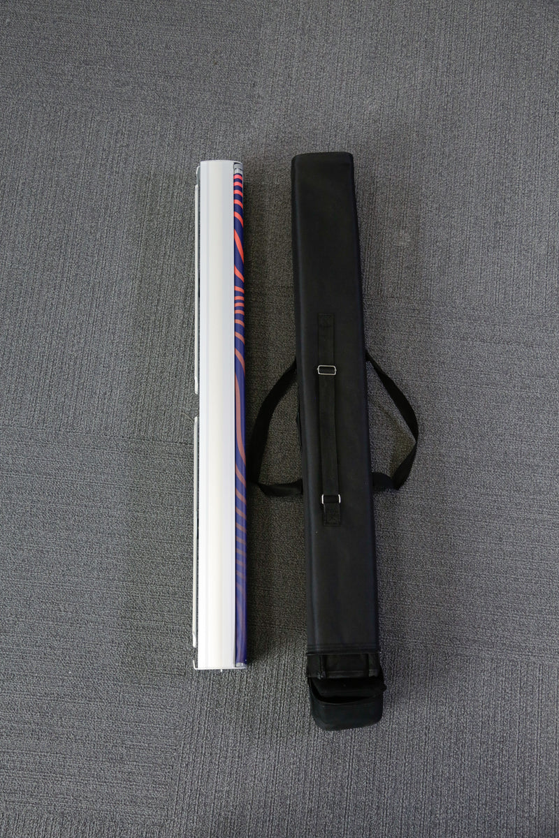 Entry-level retractable banner stand with spring-loaded aluminum base