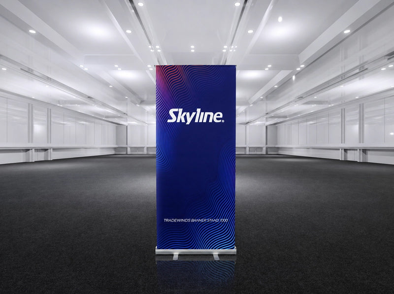 Entry-level retractable banner stand with spring-loaded aluminum base