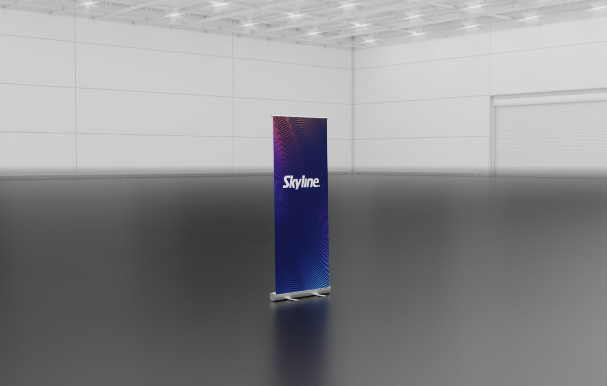 Entry-level retractable banner stand with spring-loaded aluminum base