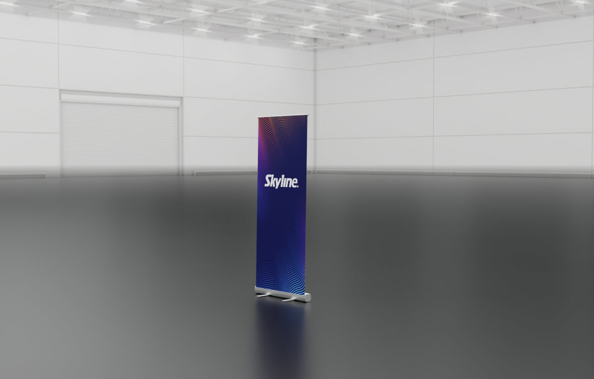 Entry-level retractable banner stand with spring-loaded aluminum base