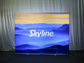 Pop-up 10-foot straight backlit display with silicon-edge fabric graphics