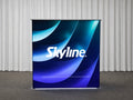 Small display table with backlit wrap-around graphic