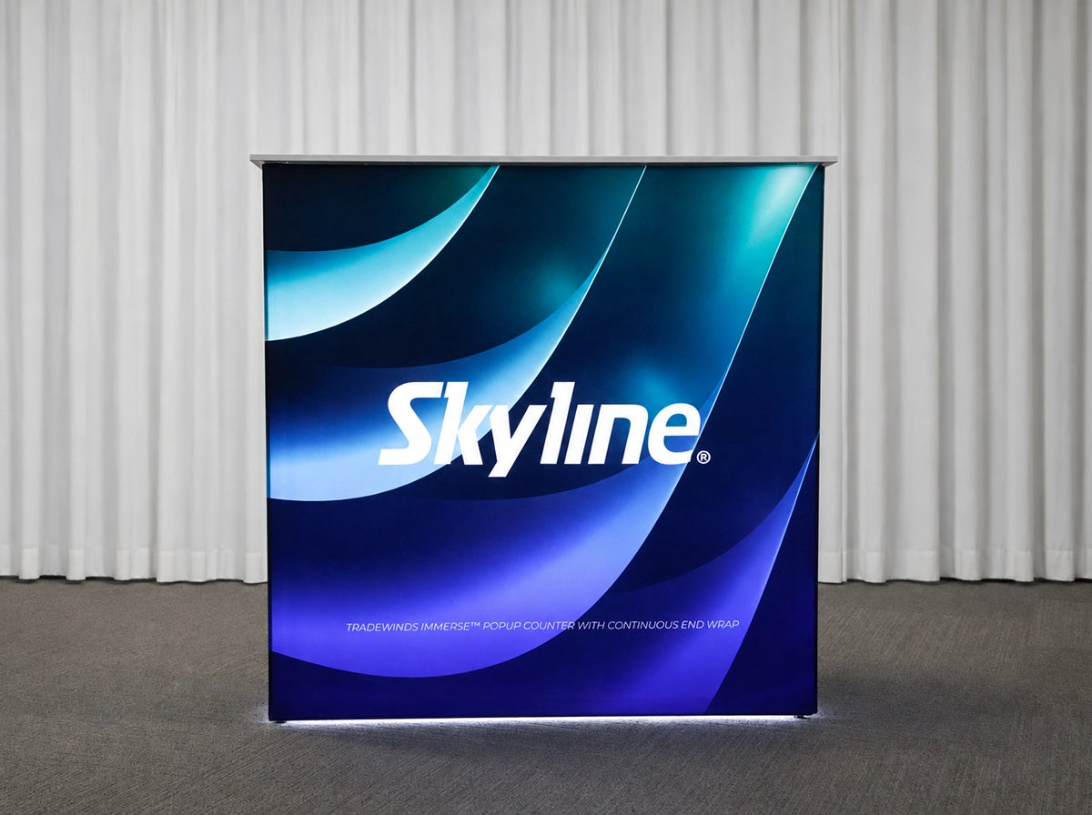Small display table with backlit wrap-around graphic